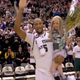 Adreian Payne carries Lacey Holsworth.
Youtube